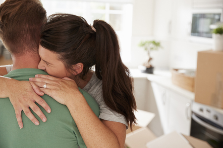 Loving Couple Celebrating Engagement At Homeの写真素材