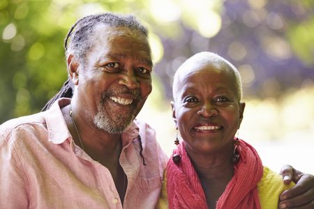 Portrait Of Senior Couple On Walk In Countryside Togetherの写真素材