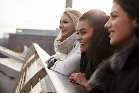 Group Of Young Female Friends Visiting London In Winterの写真素材