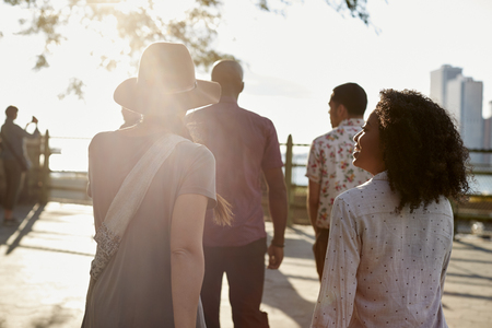 Friends Visiting New York With Manhattan Skyline In Backgroundの写真素材