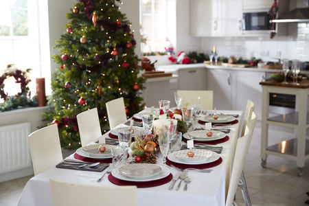 Table Set For Family Christmas Meal At Homeの写真素材