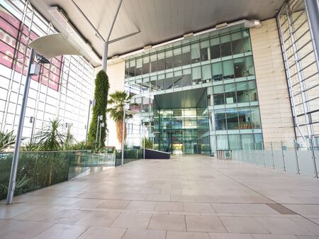 Interior View From Modern Office Lobby Of Empty Floors And Staircases