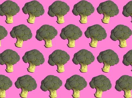 Graphic Background Pattern Of Broccoli Against Pink Backgroundの写真素材