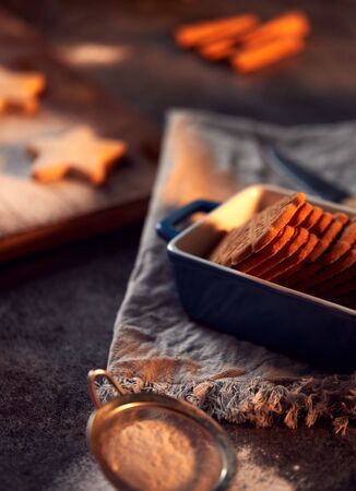 Freshly Baked Christmas Cookies On Board Ready For Decorationの写真素材