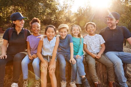 Portrait Of Adult Team Leaders With Group Of Children At Outdoor Activity Campの写真素材