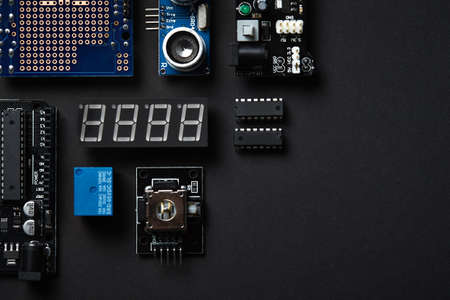 Overhead Flat Lay Shot Of Electronic Computer Components On Black Backgroundの写真素材