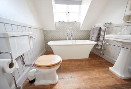 Interior View Of Beautiful Bathroom With Free Standing Bath In Family Home