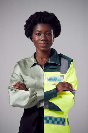 Concept Portrait Of Woman Showing Contrasting Day And Night Job Roles In Business And As Paramedicの写真素材