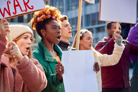 Group Of Protestors With Placards On Anti War Demonstration Marchの写真素材