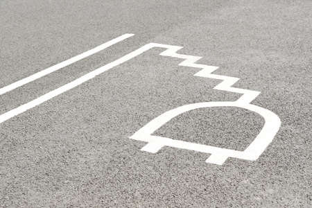 Road Marking For Electric Car Charging Point In Car Parkの写真素材