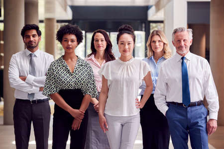 Portrait Of Multi-Cultural Business Team Inside Modern Office Building