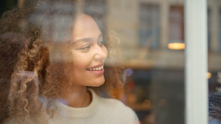 View Through Window Of Woman Meeting Man Sitting In Cafe Or Restaurantの写真素材