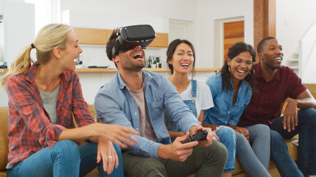 Group Of Multi Cultural Friends Playing Computer Game With Virtual Reality Headset At Home
