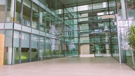 Exterior Of Modern Glass Office Building Showing Lobby And Staircasesの写真素材