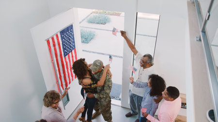 Multi Generation Family Greeting Soldier Husband In Uniform Visiting Home On Leaveの写真素材