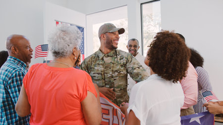 Multi Generation Family Greeting Soldier Husband In Uniform Visiting Home On Leaveの写真素材