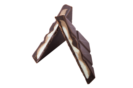 Chocolate piece isolated at white backgroundの写真素材