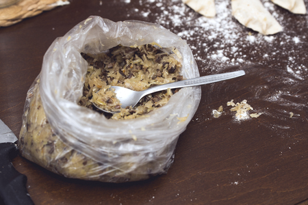 Homemade stuffing of cabbage and mushrooms for Dumplingsの写真素材