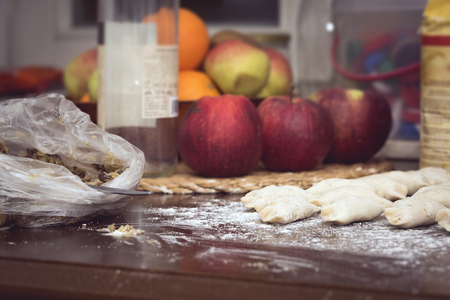 Homemade Dumplings prepared on the brown wooden table by traditional wayの写真素材