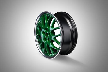 Green car lloy rim at gray backgroundの写真素材