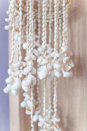 Wind bell shell mobile in vintage styleの写真素材