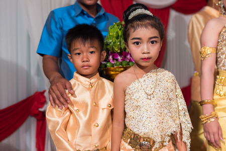 Small Khmer kids posing for photography in traditional wedding outfit. Kampot 07 july 2018, Cambodia.のeditorial素材