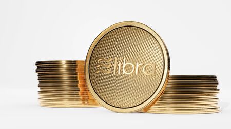 Concept of golden Libra coin with logo on front. New project of digital crypto currency payment. 3D render Coins placed on a white background.の写真素材