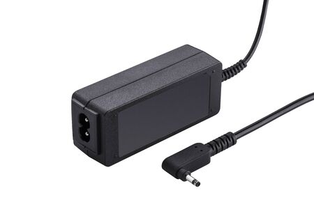 Plastic laptop power adapter on a white background isolated.の写真素材