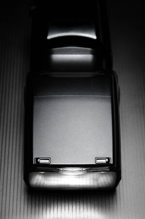 External flash lamp for dslr camera on the dark background.の写真素材
