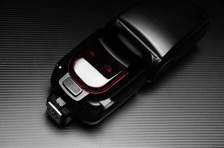 External flash lamp for dslr camera on the dark background.の写真素材