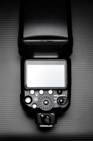 External flash lamp for dslr camera on the dark background.の写真素材