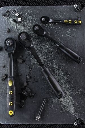 Professional ratchet tools placed on a black background, Wrench Tool for the work in the workshop.の写真素材