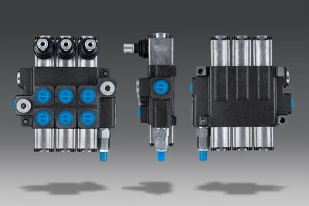 Three section Hydraulic distributor of the tractor on isolated gray background with shadowの写真素材