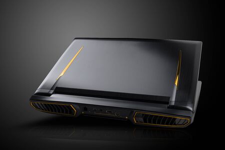 Gaming laptop on black background. Laptop designed for gamers or professional players 3d or renderingの写真素材