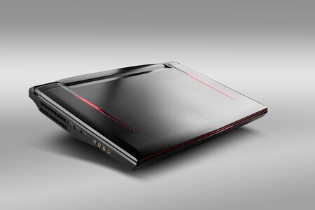 Photography of gaming laptop from the front view, placed on gray background. Laptop designed for gamers or professional players or 3d renderingの写真素材