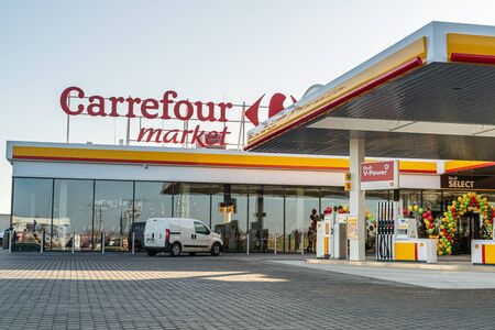 Katy Wroclawskie, Poland - December 20, 2019: Official big opening of Carrefour discount market at the Shell station Katy Wroclawskie.のeditorial素材