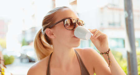 Woman drinking coffee, morning breakfastの写真素材