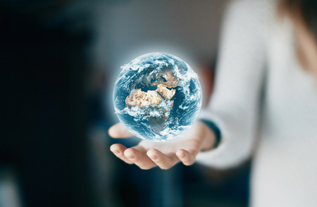 Earth on hand, world and environmentの写真素材