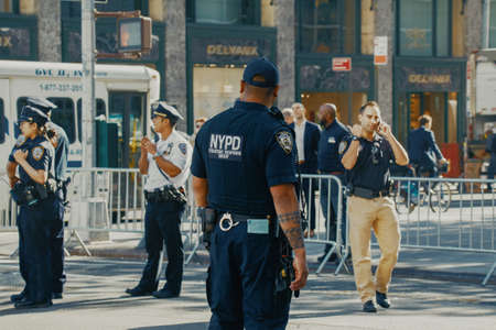 NEW YORK, USA - 01 MAY, 2020: Police officers performing his duties on the streets of Manhattan. New York City Police Department, NYPDのeditorial素材