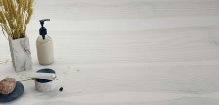 Bath cosmetic products set on wooden background. Bathroom body care concept. 3d renderingの写真素材
