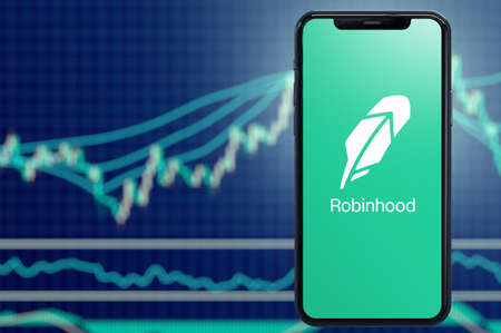 Milan, Italy: February 26, 2021: Robinhood app and Logo on screen. Robinhood financial services...
