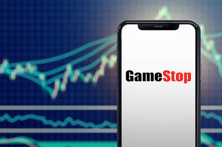 Milan, Italy: February 26, 2021: Gamestop retail company logo on the smartphone and its authentic stock price chart for the last 5 days. 3d renderingのeditorial素材