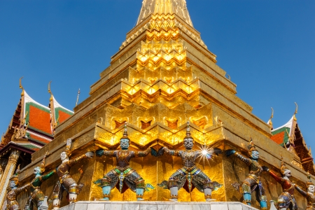 giant statue hold base of pagoda at Wat Phra Kaew ,Thailandの写真素材
