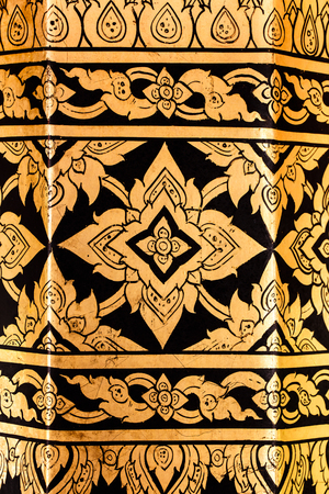 The thai painting on pillar of thai templeの写真素材