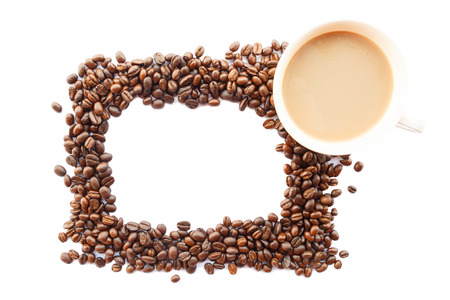 picture frame was created by coffee beans and cup on white background (isolated)の写真素材