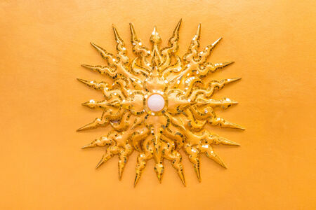 electric bulb was decorated to sun shape on ceiling at Wat Rong Khun ,Chiangrai ,Thailandの写真素材