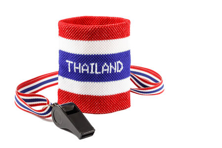 Whistle and wristband in thai flag pattern on white backgroundの写真素材
