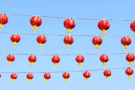 Chinese lamp on blue sky at chinese new year in Thailandの写真素材