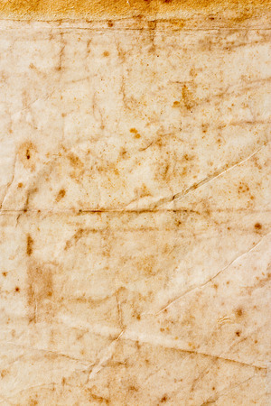 The texture of dirty and crumple old paperの写真素材
