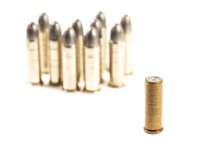 Think different  group of bullets and single bullet on white background 